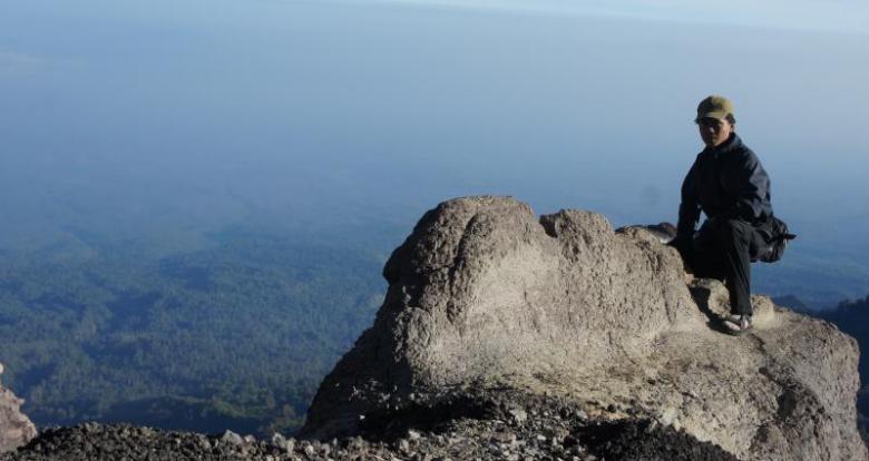Standing at Peak of Mount Raung Volcano, Indonesia